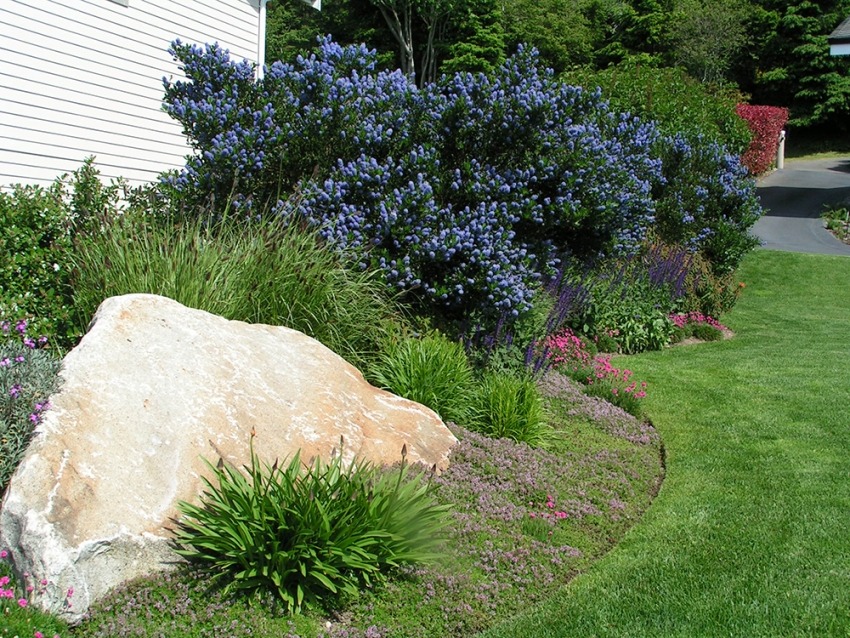View more about Large Stone Landscaping - Rocky Bay Garden Boulder Placement