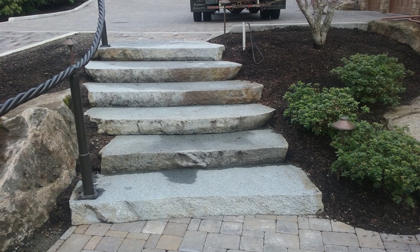 View more about Large Stone Steps with Wrought Iron Railing