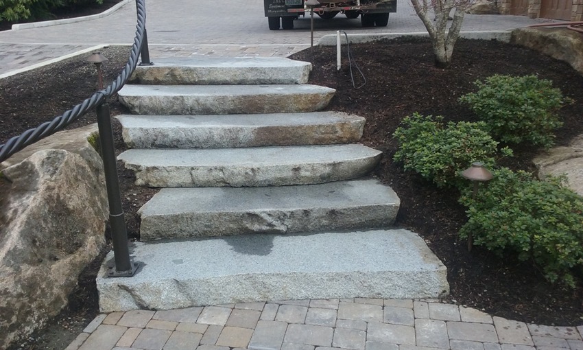 Large Stone Steps with Wrought Iron Railing